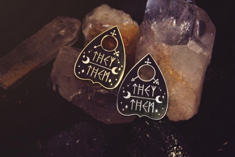 GRRRL Spells Planchette Pronoun Pin: Gold They/Them cover image