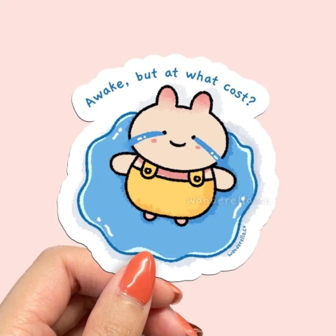 Wanderella Sticker: Awake, but at What Cost? cover image