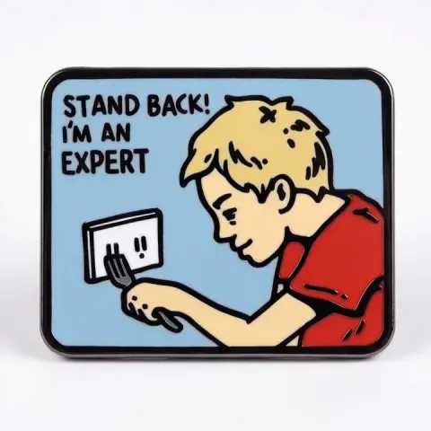 Strike Gently Enamel Pin: Stand Back! I'm an Expert! cover image