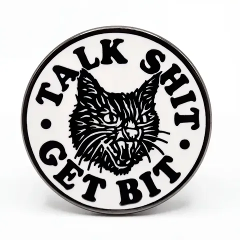 Strike Gently Enamel Pin: Talk Shit Get Bit cover image