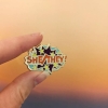 Cunning Linguist - She/They enamel pin cover image