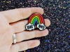 The Third Arrow Enamel Pronoun Pin: Rainbow & Clouds — She/They cover image