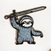Strike Gently Enamel Pin: Battle Sloth cover image