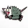 Strike Gently Enamel Pin: Eat The Rich cover image