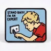 Strike Gently Enamel Pin: Stand Back! I'm an Expert! cover image
